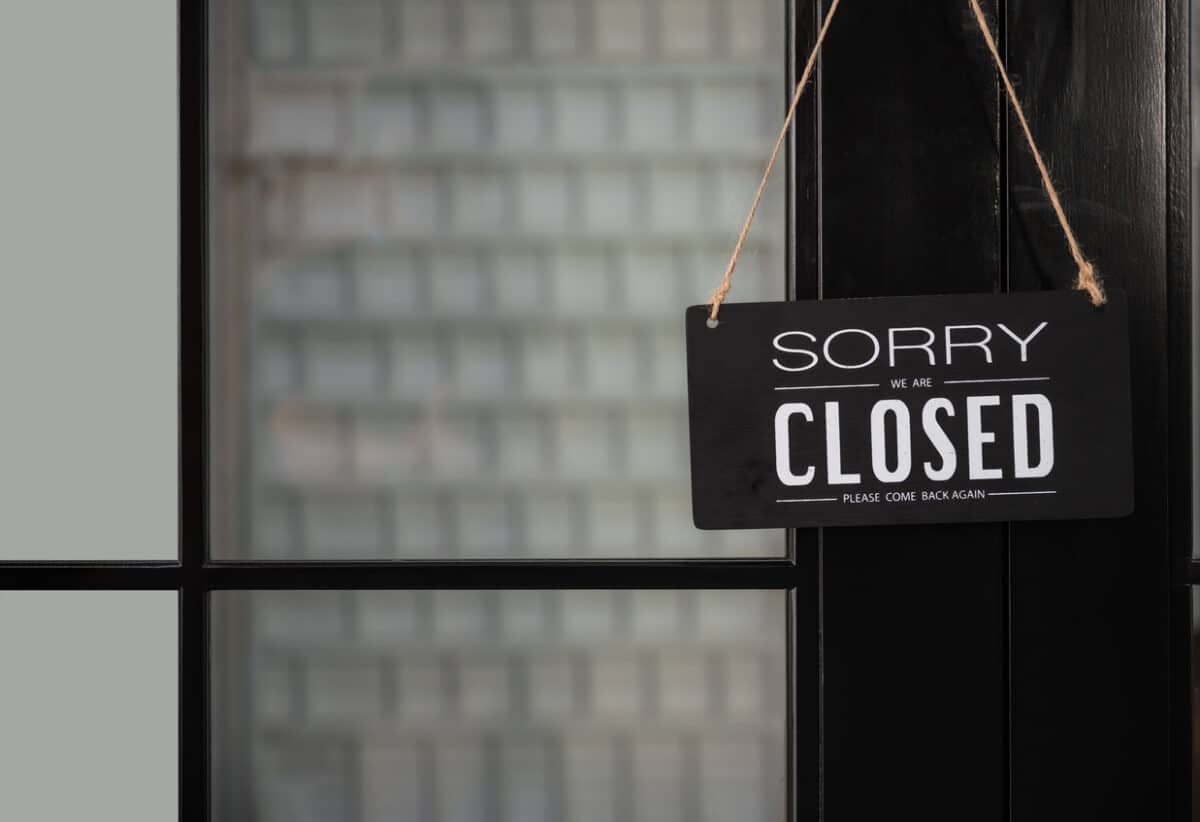 sign saying "Sorry closed" on a closed door